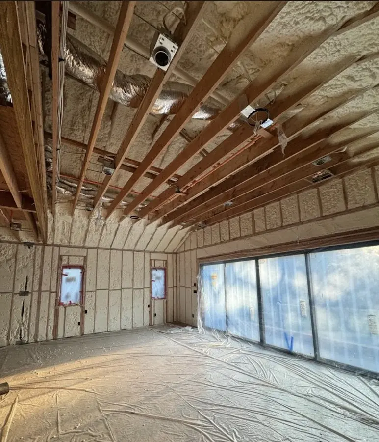 Interior walls and ceiling insulated with spray foam during new construction in Bloomingdale